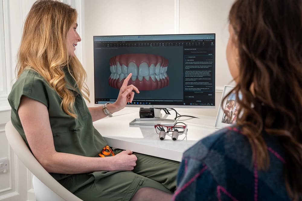 reviewing dental implant treatment plan with patient at Rancho Bernardo Dental Arts
