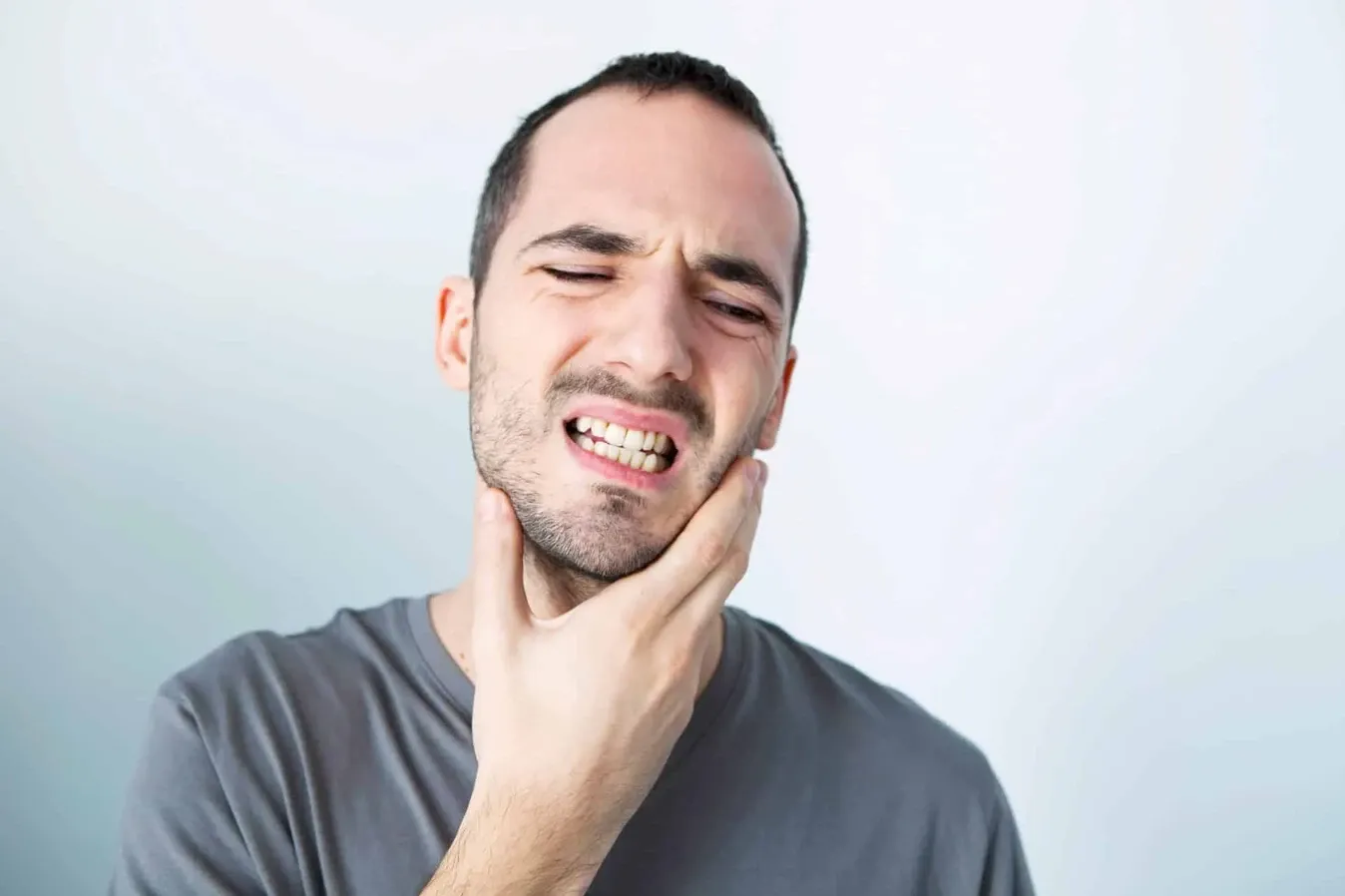 Dentist evaluating grinding wear from bruxism at Rancho Bernardo Dental Arts