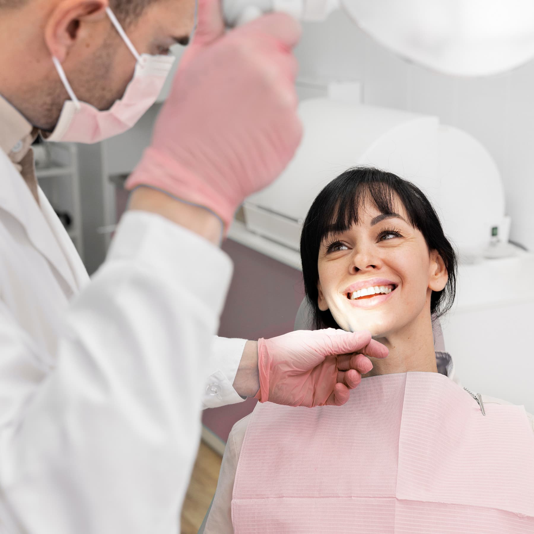 Dr. Ghandehari performing a comprehensive dental exam at Rancho Bernardo Dental Arts