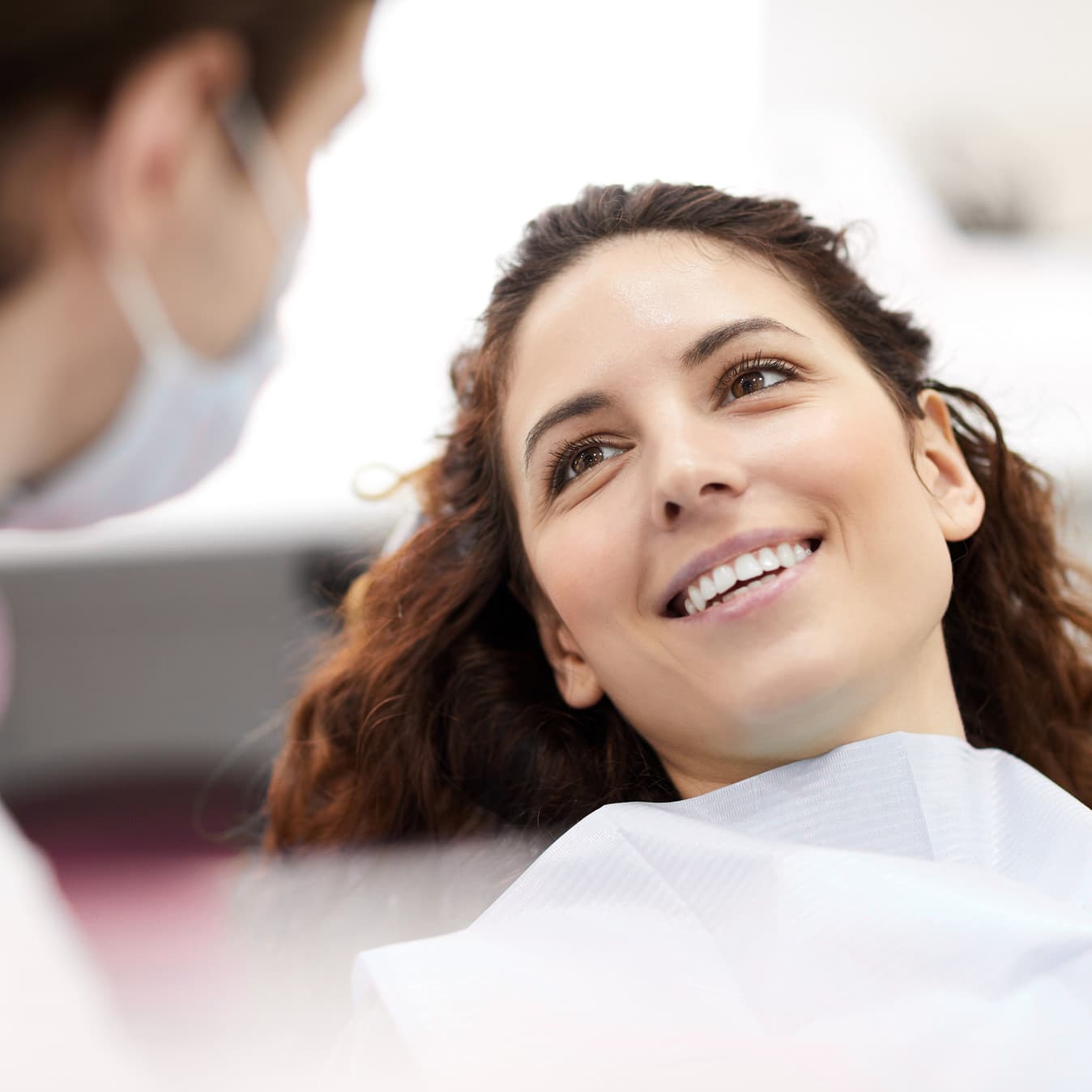 Hygienist performing a gentle deep teeth cleaning at Rancho Bernardo Dental Arts in San Diego